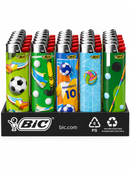 A retail display of BIC lighter matches in a black plastic tray. The set features five distinct designs: soccer, golf, handball, beach, and abstract patterns, all with red BIC logos and silver metal tips.