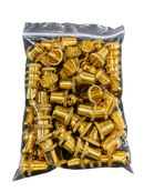 Bag of gold-colored metal components on a black background