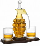 Grenade-shaped decanter with two glasses on a white background