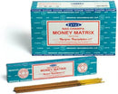Satya Nag Champa Money Matrix incense sticks with packaging on a white background